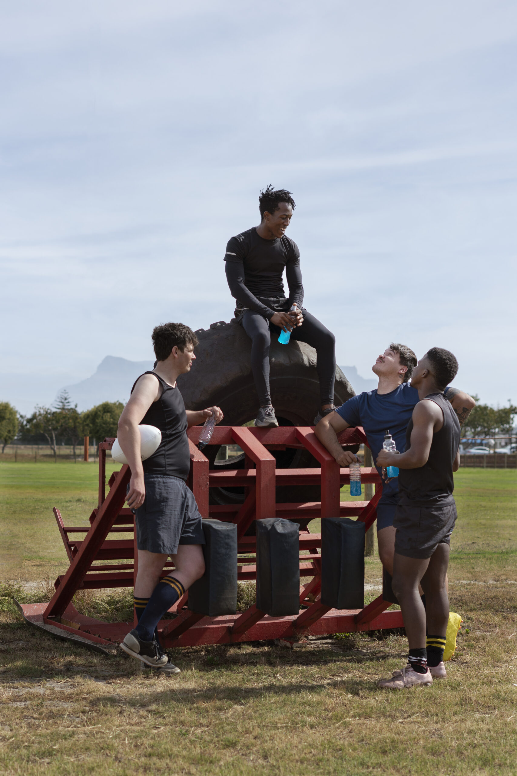 men-playing-rugby-field